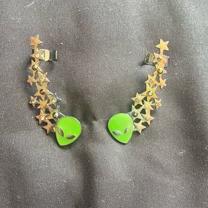 Alien star earrings